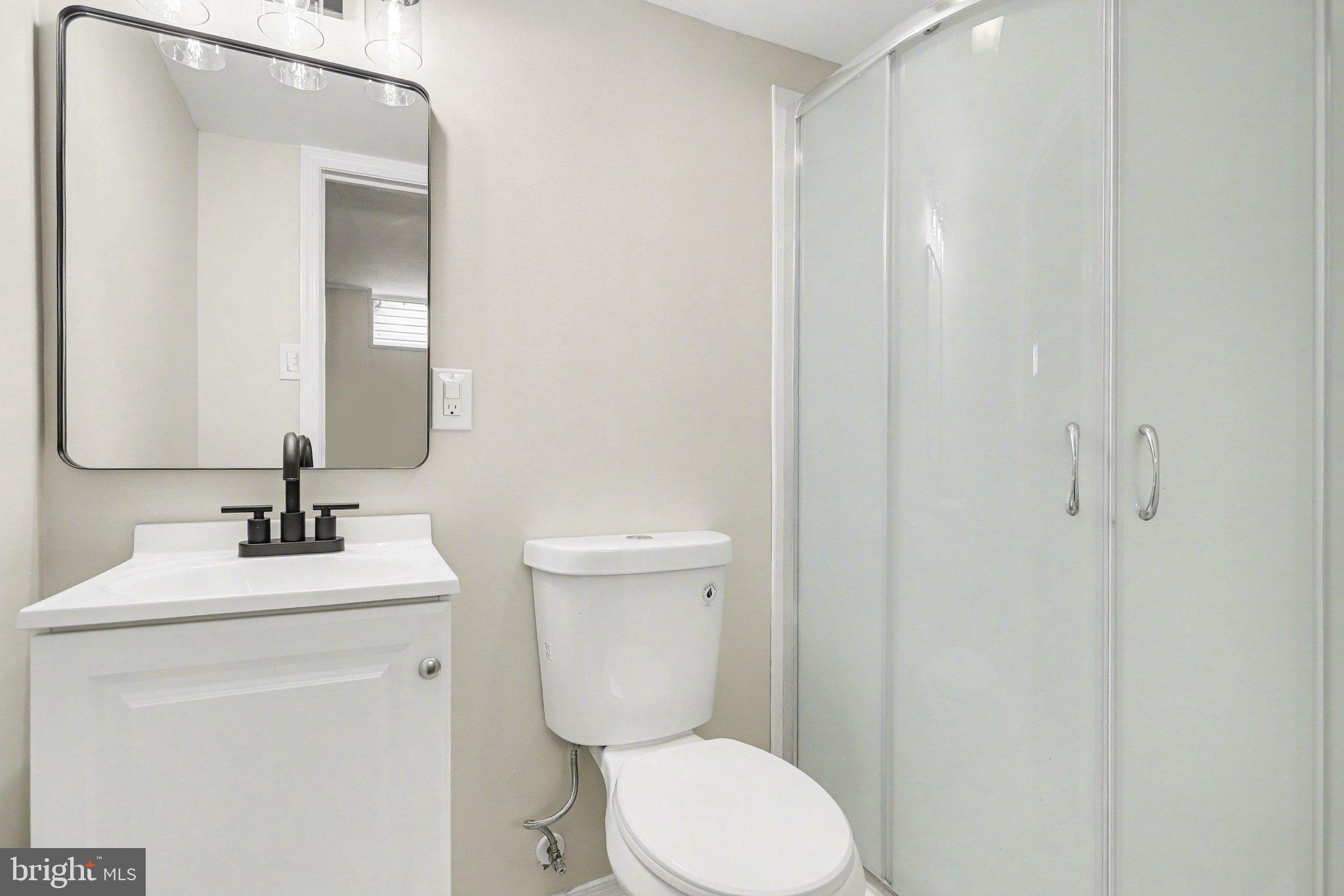 43 West High Street Windsor, PA 17366 - Photo 17 of 46 Sleek modern bathroom with elegant finishes.