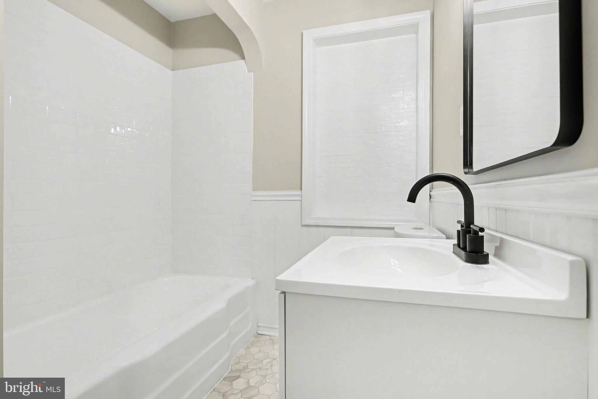 43 West High Street Windsor, PA 17366 - Photo 24 of 46 Sleek, modern bathroom with elegant finishes.