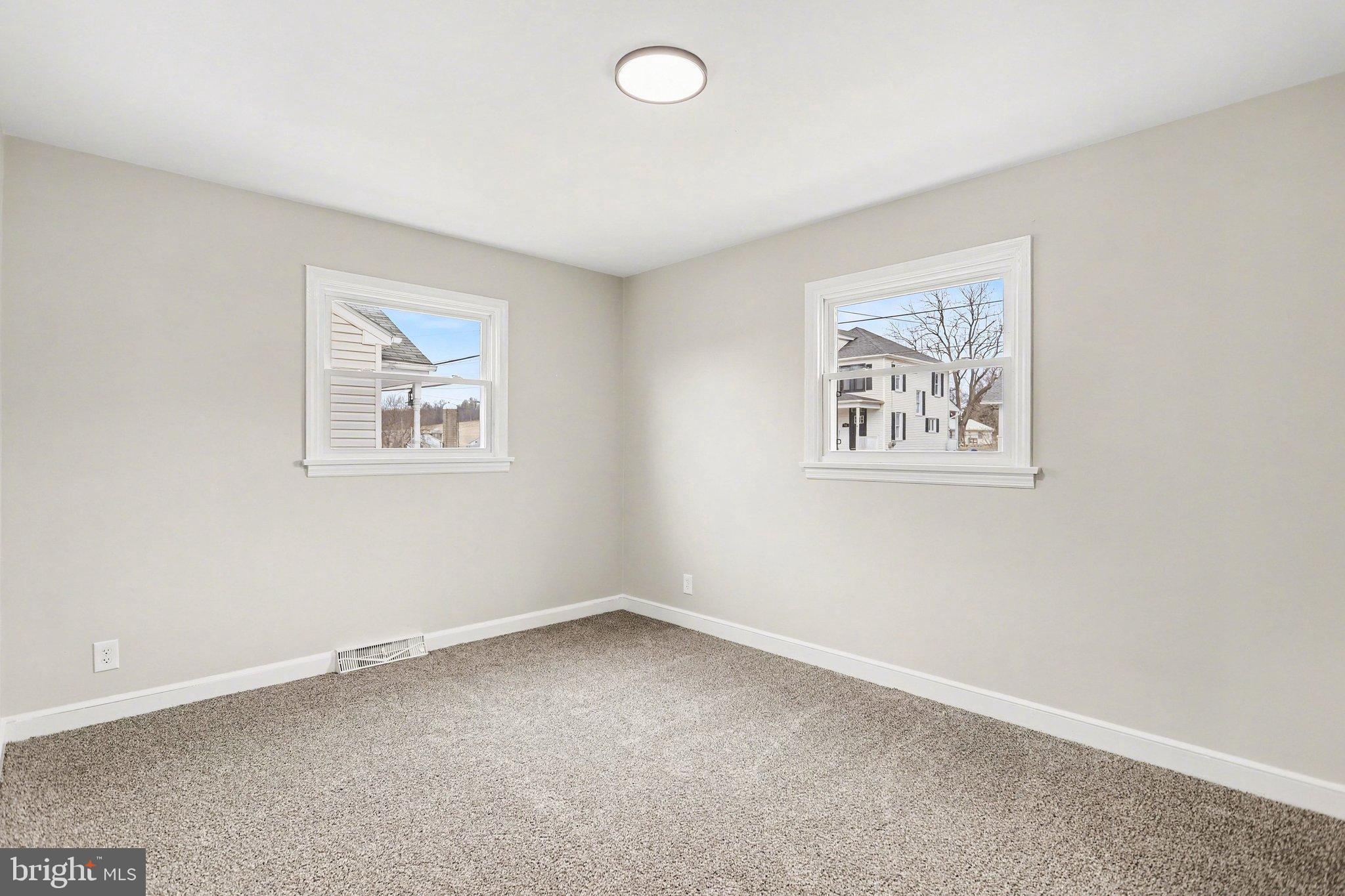 43 West High Street Windsor, PA 17366 - Photo 28 of 46 Bright and airy corner room with windows.