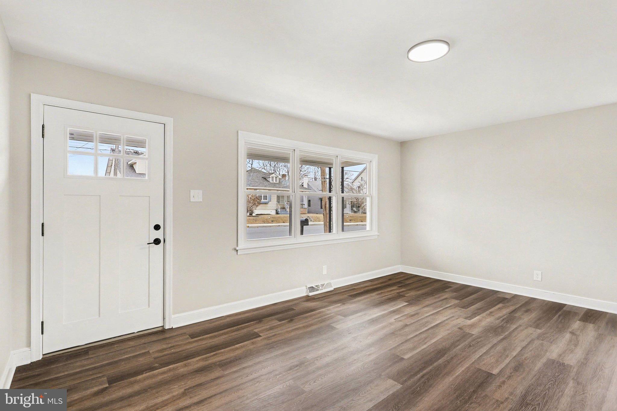 43 West High Street Windsor, PA 17366 - Photo 7 of 46 Bright and airy entryway with modern charm.