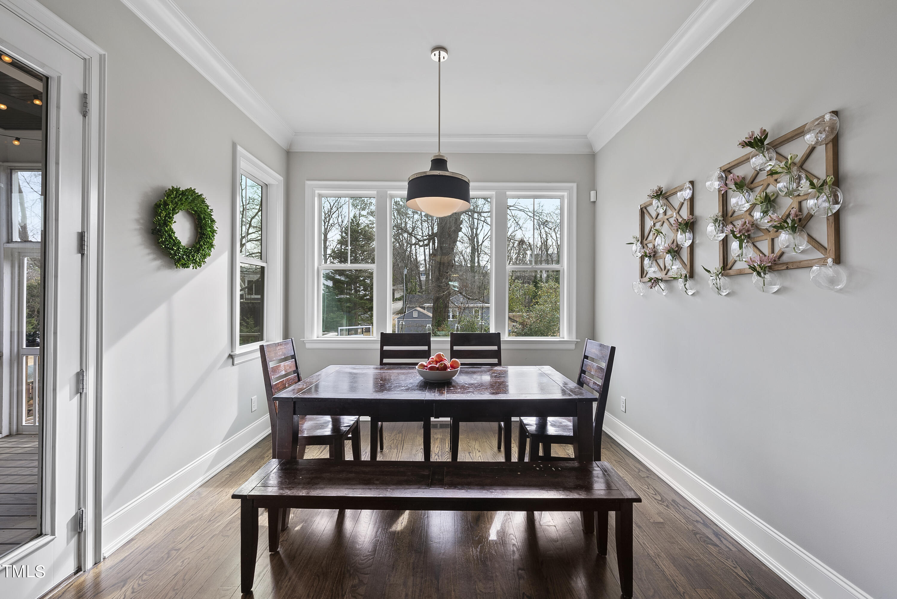 512 Mial Street Raleigh, NC 27608 - Photo 11 of 32 a view of a dining room with furniture window and outside view