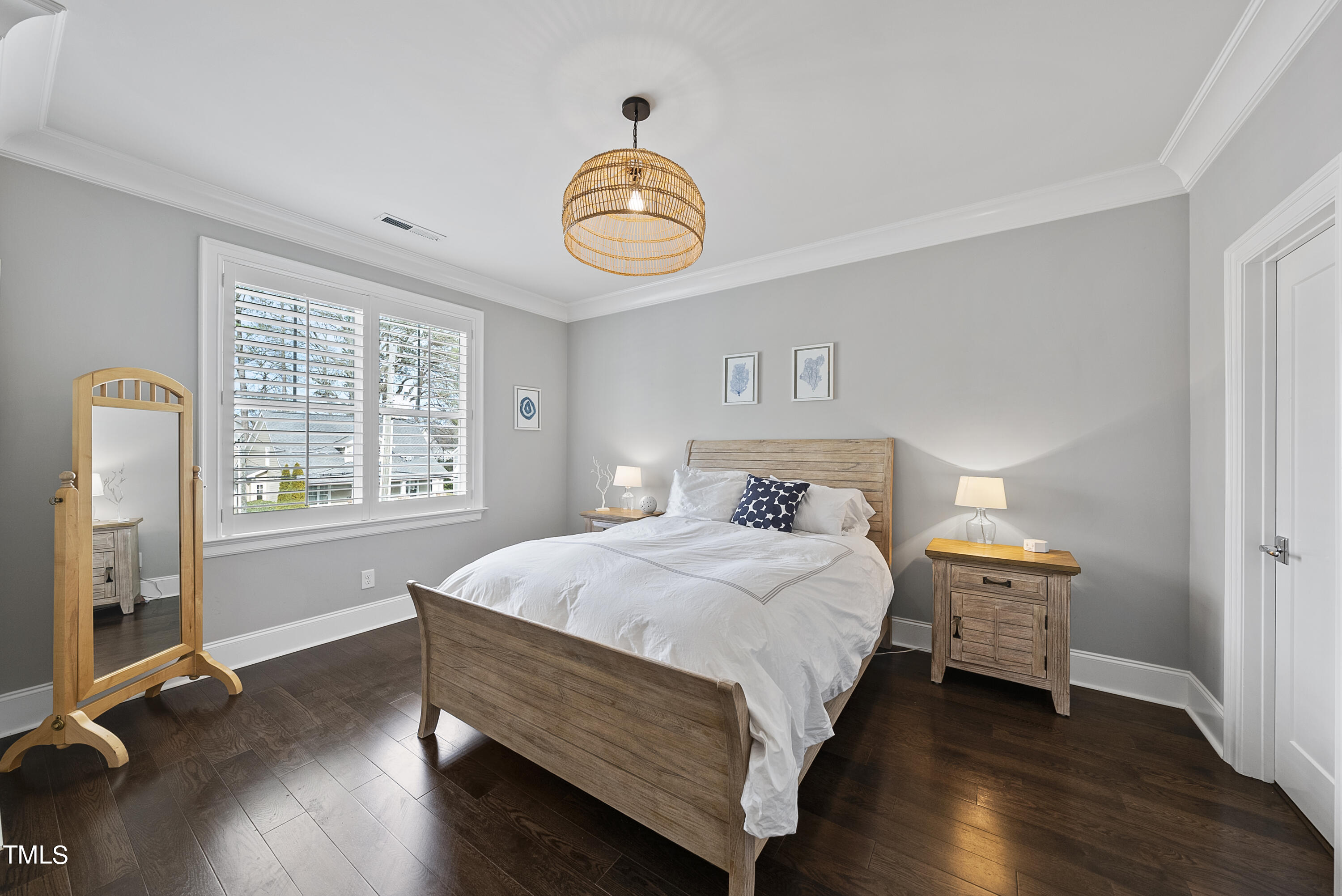512 Mial Street Raleigh, NC 27608 - Photo 20 of 32 a bedroom with a bed and a window