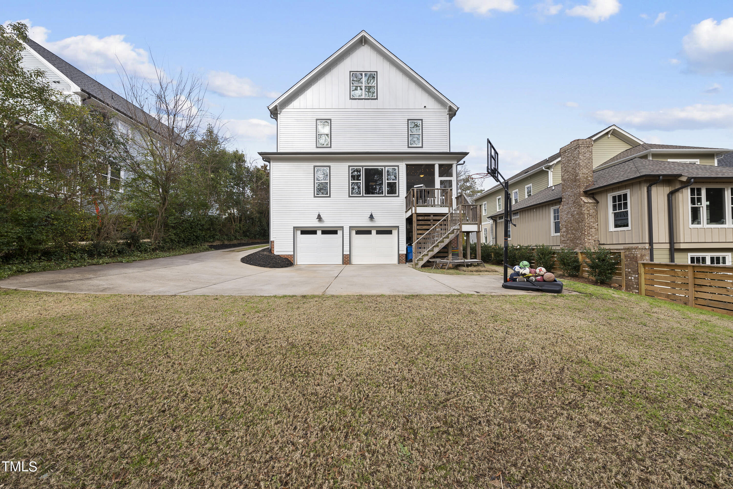 512 Mial Street Raleigh, NC 27608 - Photo 28 of 32 a front view of a house with yard and garage