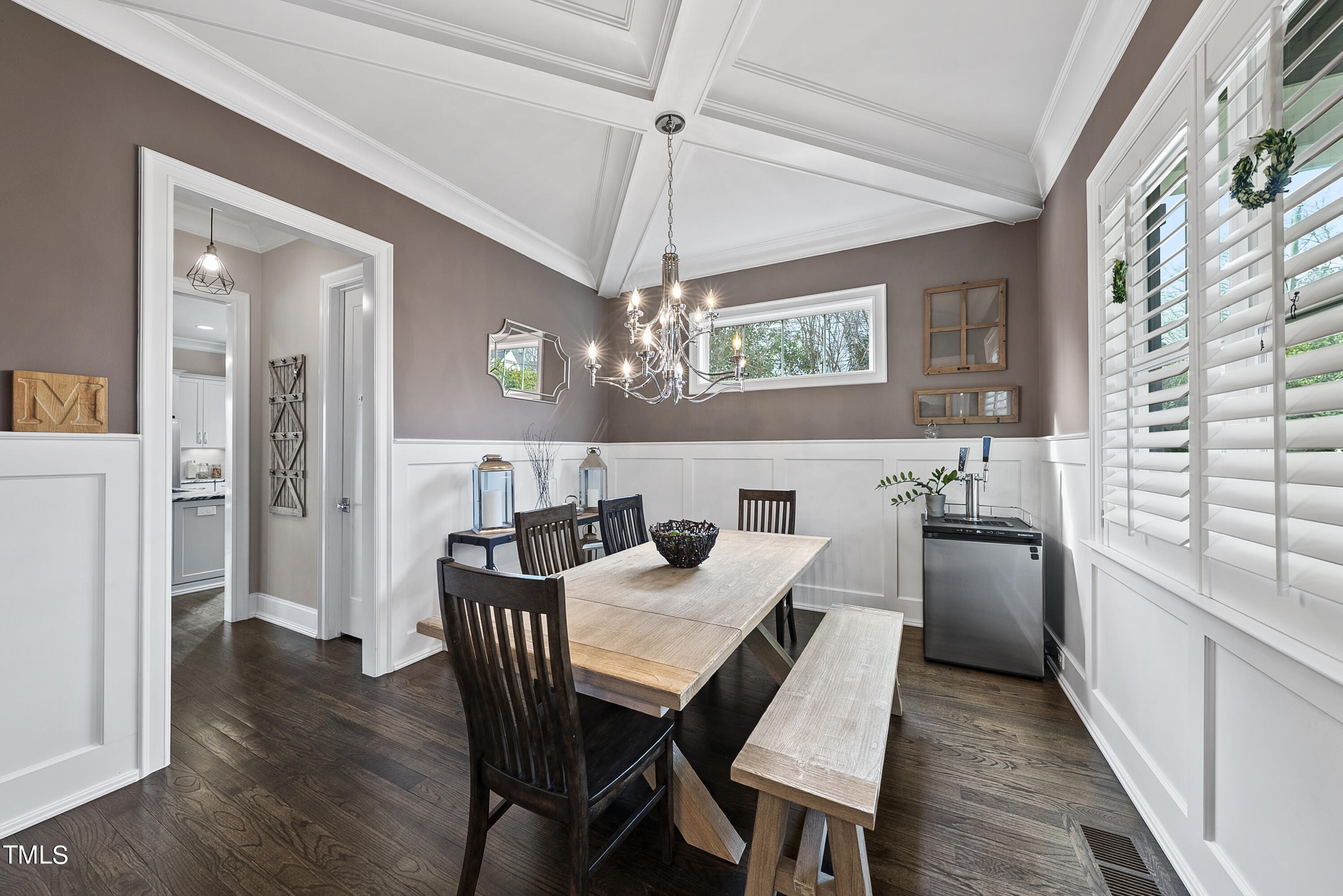 512 Mial Street Raleigh, NC 27608 - Photo 6 of 32 a view of a dining room and livingroom with furniture wooden floor a chandelier
