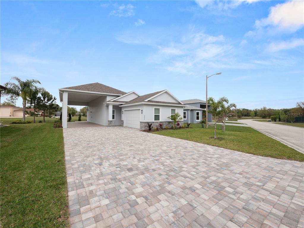 234 Laynewade Road Polk City, FL 33868 - Photo 1 of 1 a front view of a house with a yard