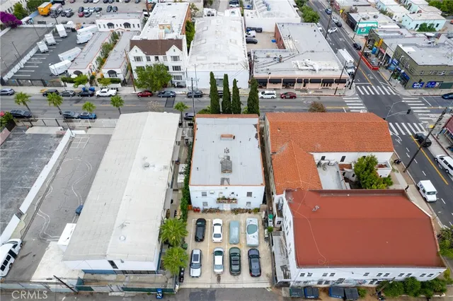 an aerial view of a building with outdoor space