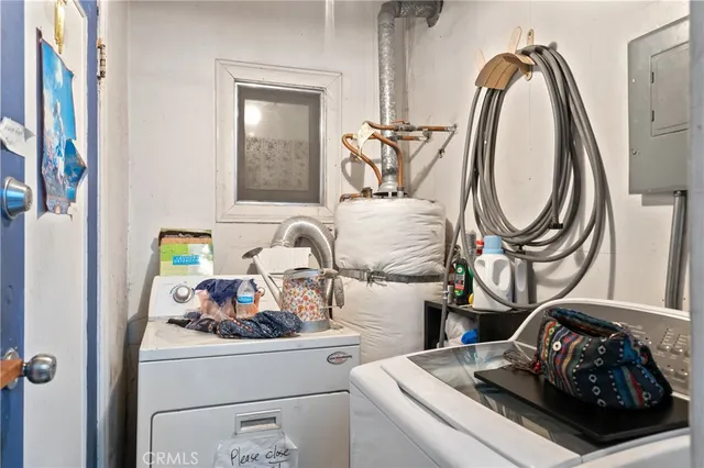 a kitchen with stainless steel appliances granite countertop a stove and cabinets