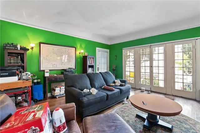 a bathroom with a sink mirror and toilet