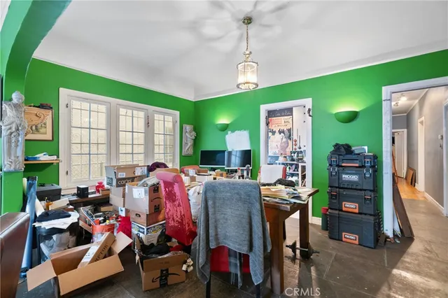 a room with furniture and a chandelier
