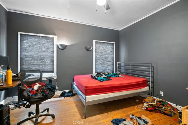 a living room with lots of furniture and white walls