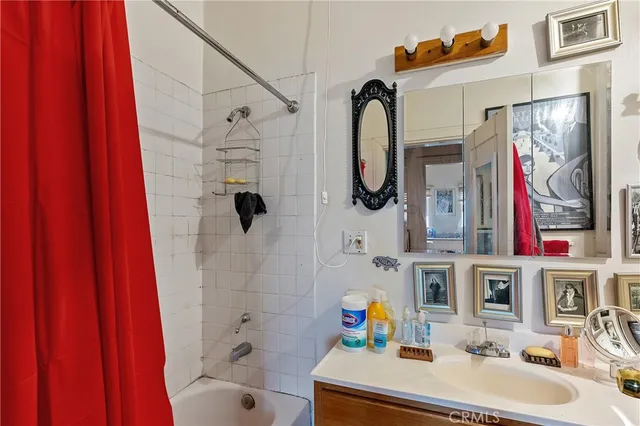 a room with gym equipment and windows