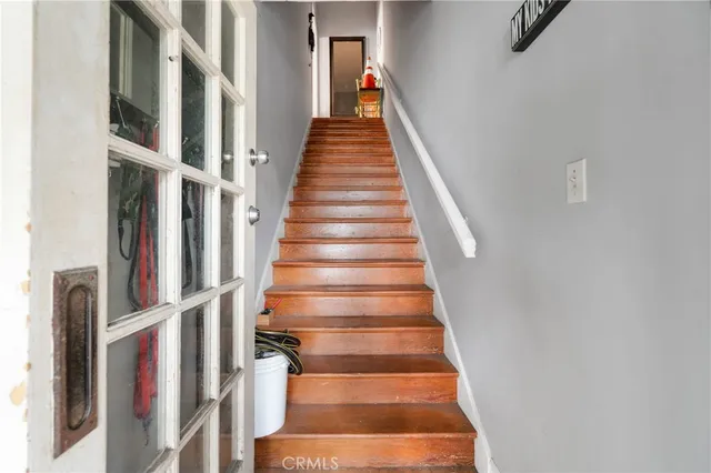 a bathroom with a sink a vanity and a mirror