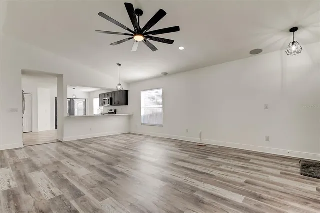 a view of an empty room and window