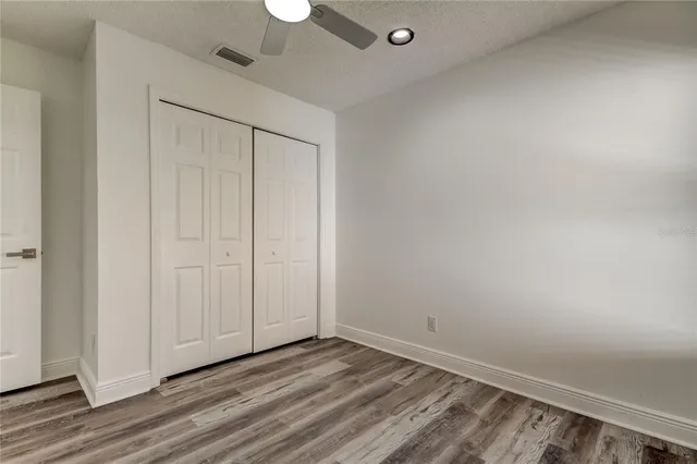 a view of a backyard with pathway