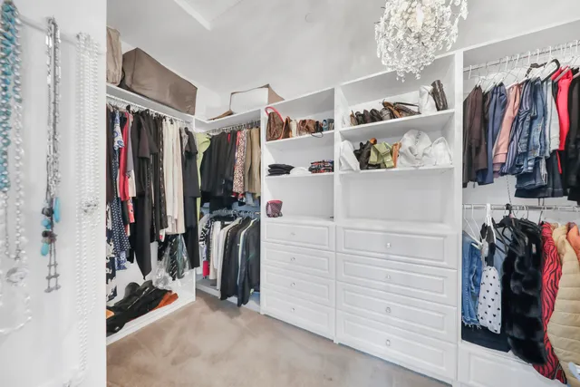 a workspace with a desk chair and a stove top oven