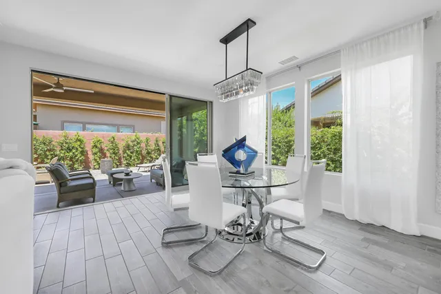 a outdoor living space with furniture and garden view