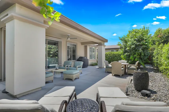 an aerial view of a house with a garden