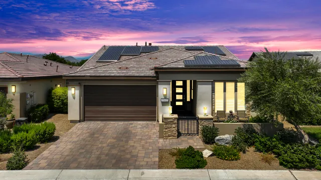 a view of a house with a yard porch and sitting area