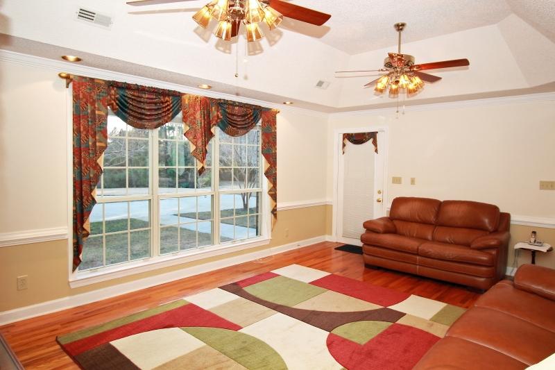 7829 Seafield Road Hollywood, SC 29449 - Photo 24 of 35 Another view of family room with exit to