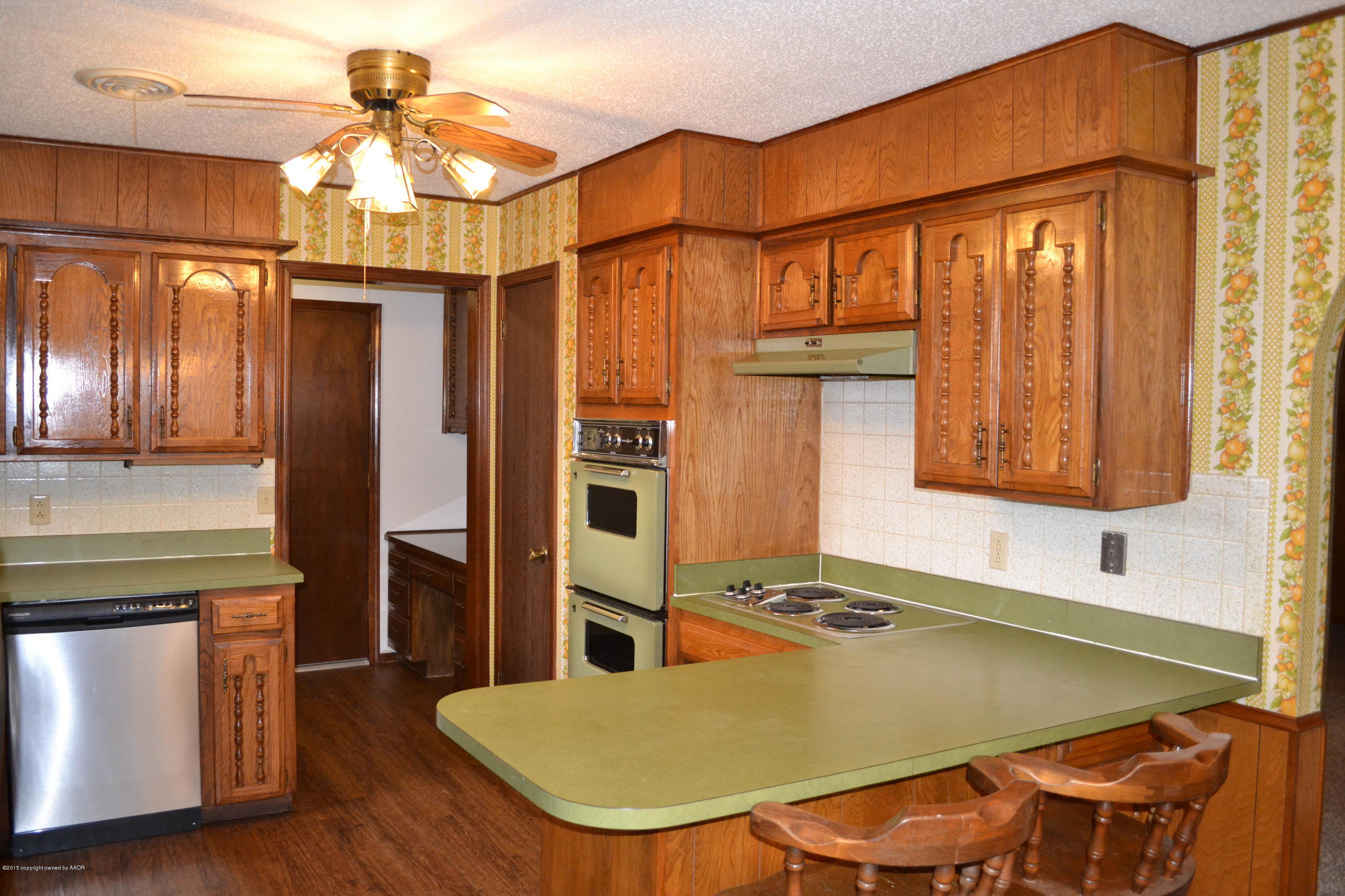 4910 South Georgia Street Amarillo, TX 79110 - Photo 47 of 70 a view of a dining room with furniture window and wooden floor