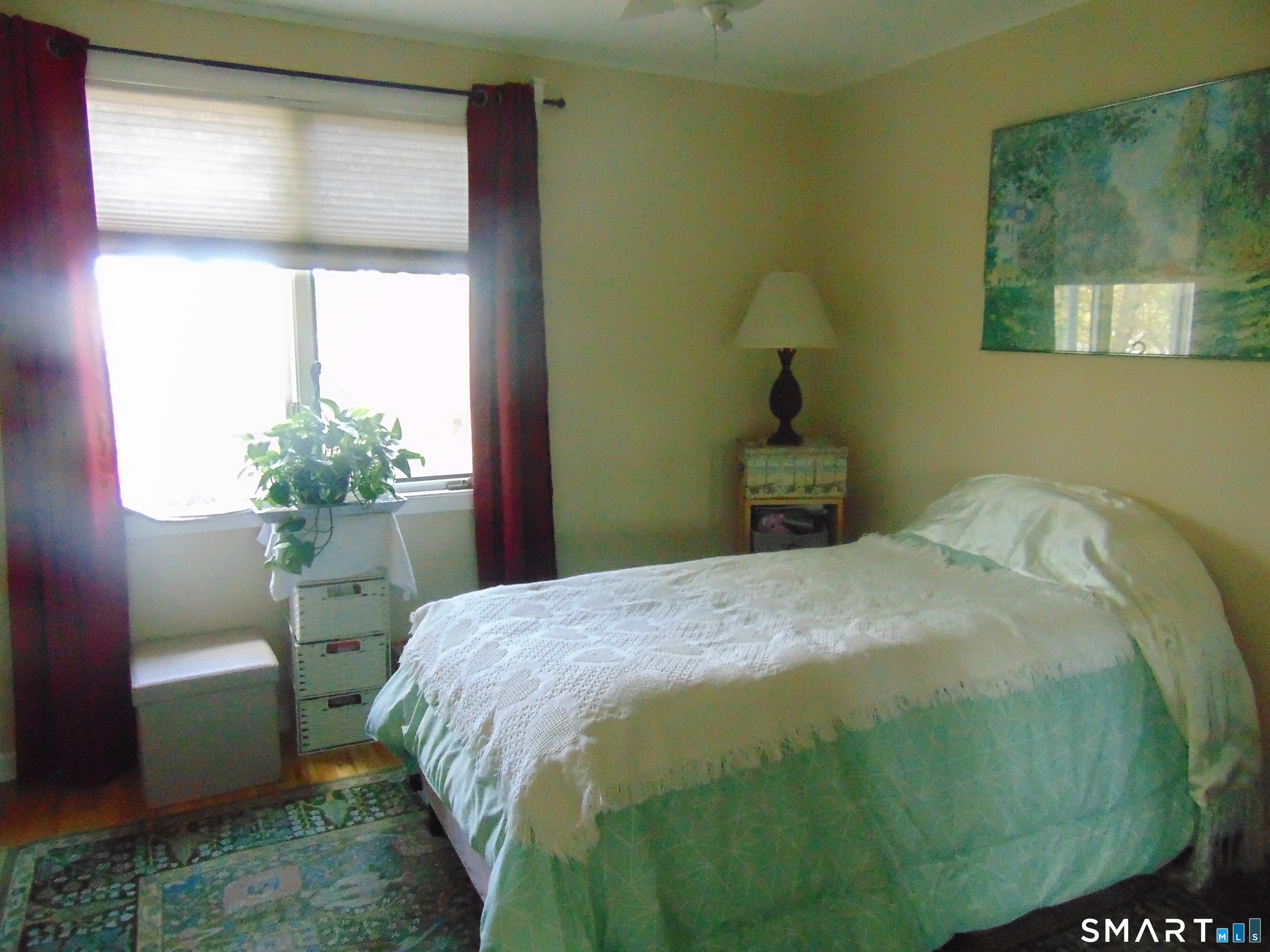882 North Colony Road, Unit 31 Meriden, CT 06450 - Photo 23 of 34 a bedroom with a bed and a window