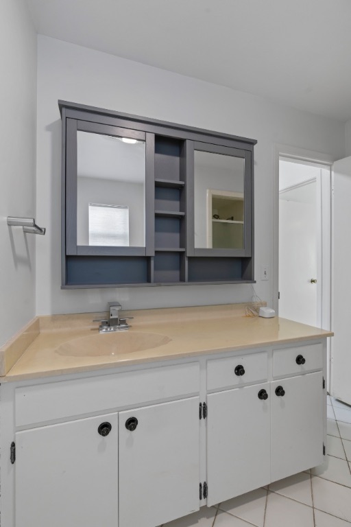 103 Comet Lakeway, TX 78734 - Photo 22 of 38 a bathroom with a sink and a mirror