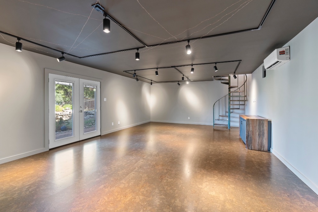 103 Comet Lakeway, TX 78734 - Photo 27 of 38 a view of empty room with wooden floor