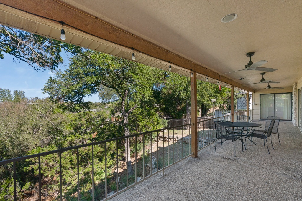 103 Comet Lakeway, TX 78734 - Photo 29 of 38 a view of a porch with furniture and a yard