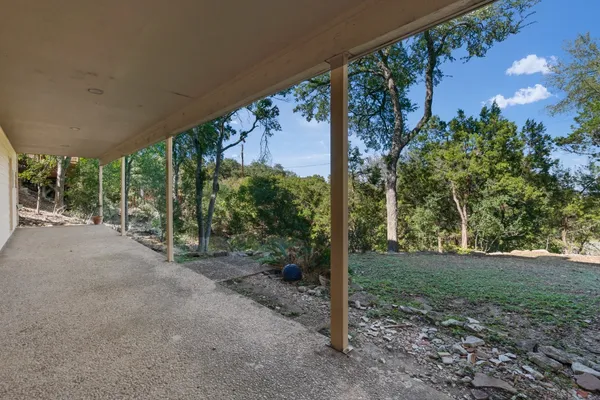 a view of a trees with a yard
