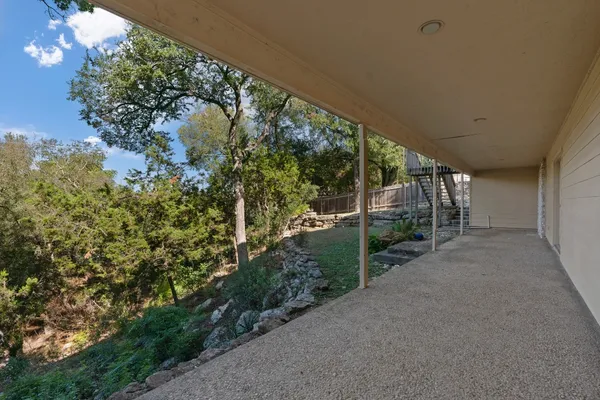 a view of a garden with a tree
