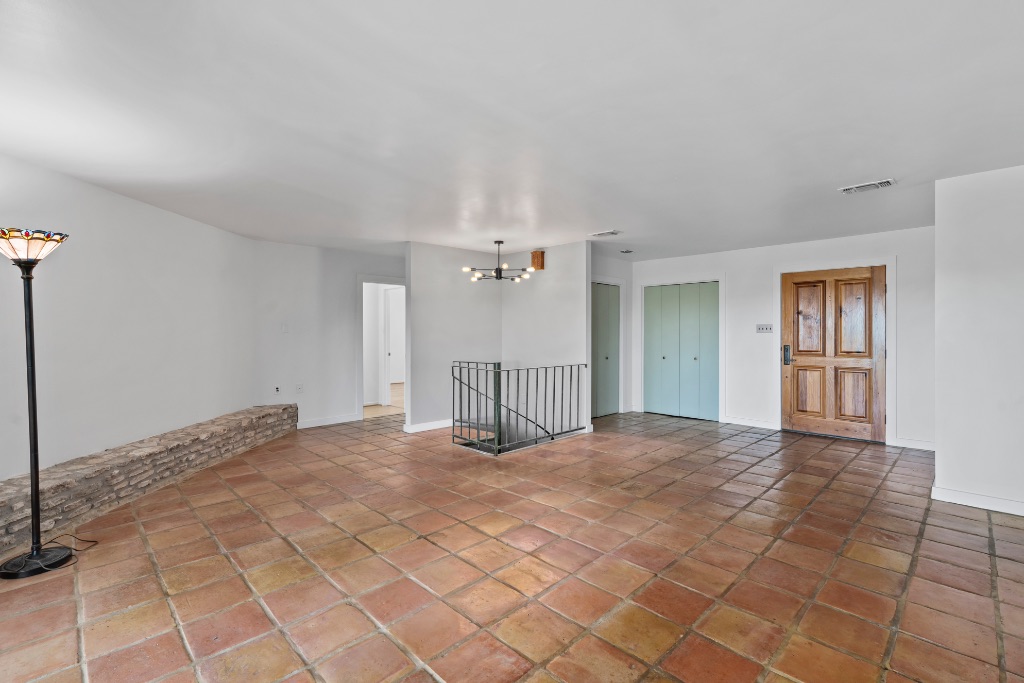 103 Comet Lakeway, TX 78734 - Photo 6 of 38 a view of an empty room with a window