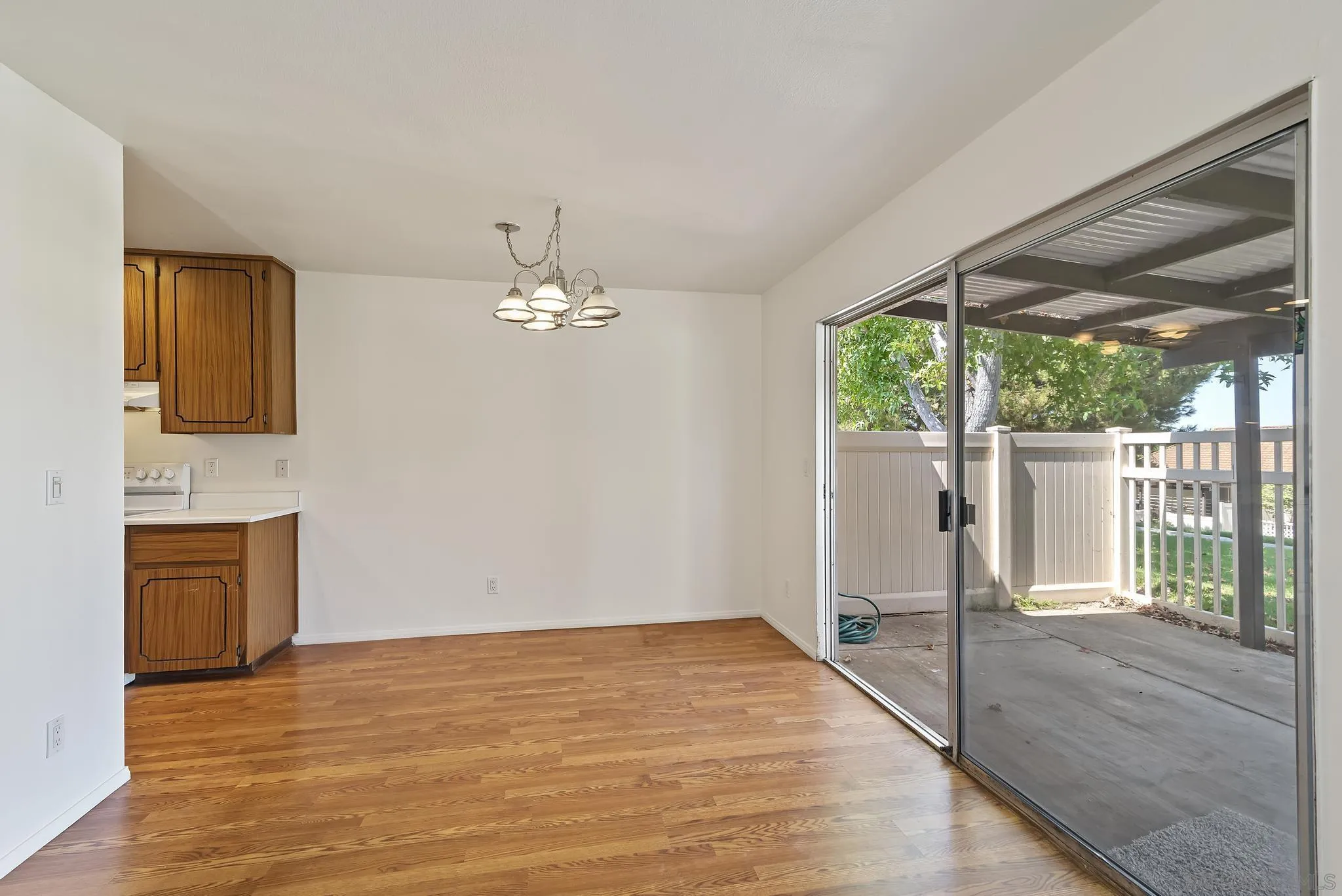 354 Abington Road Encinitas, CA 92024 - Photo 8 of 35 a view of empty room with wooden floor and fan