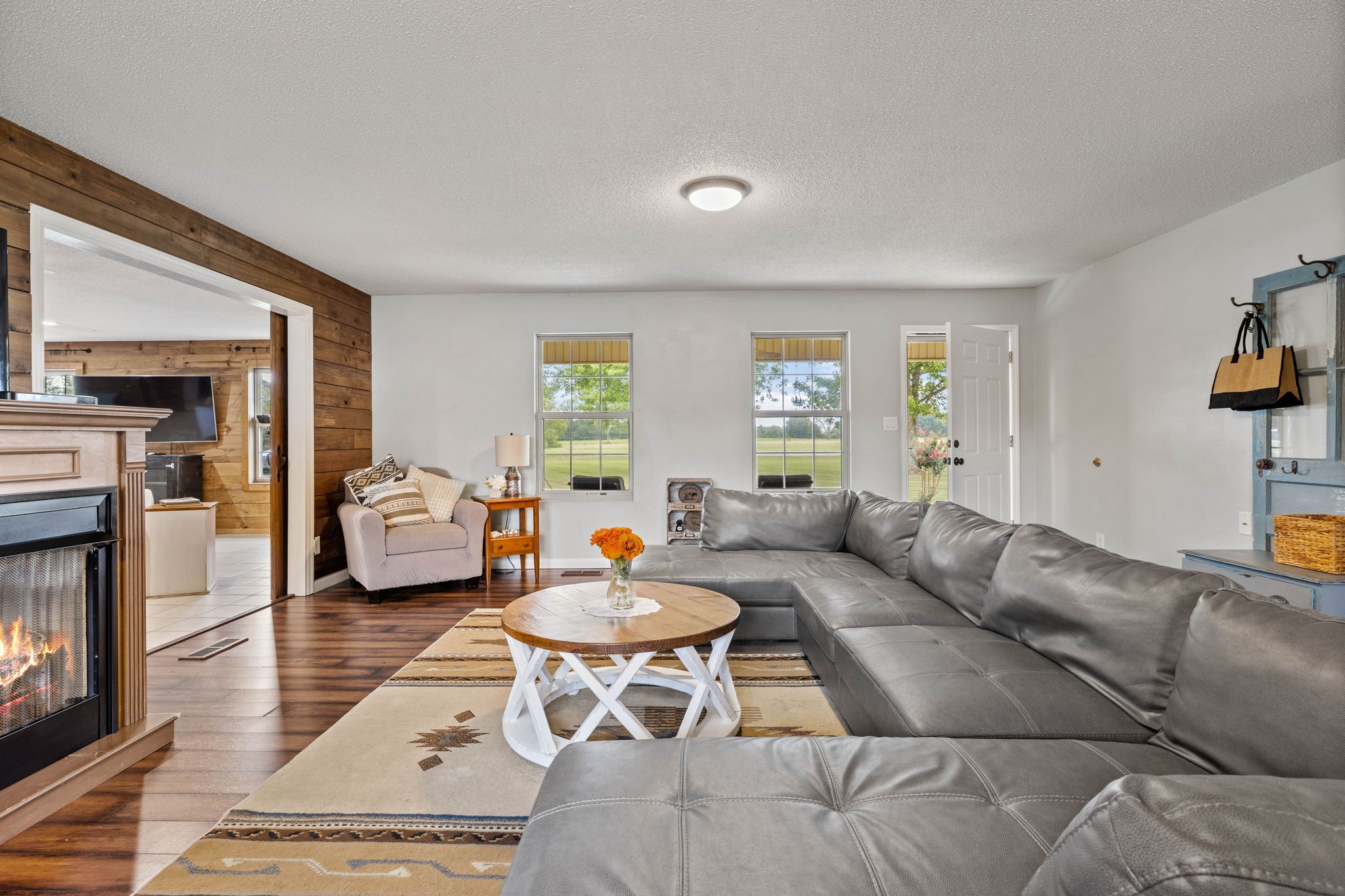 1146 Longview Road Unionville, TN 37180 - Photo 12 of 55 a living room with furniture and a fireplace