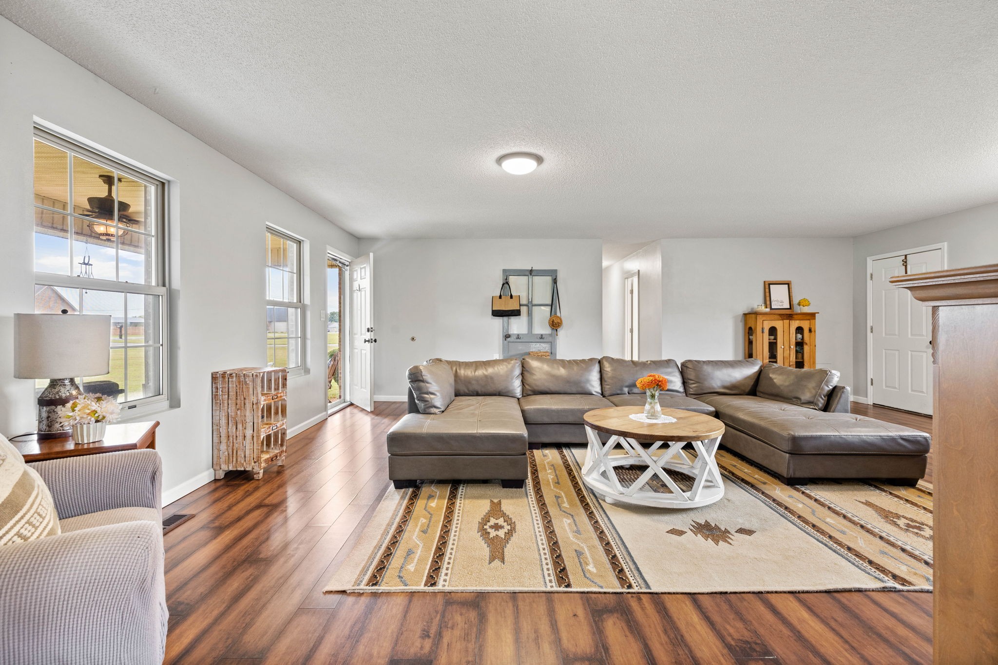 1146 Longview Road Unionville, TN 37180 - Photo 13 of 55 a living room with furniture and a wooden floor