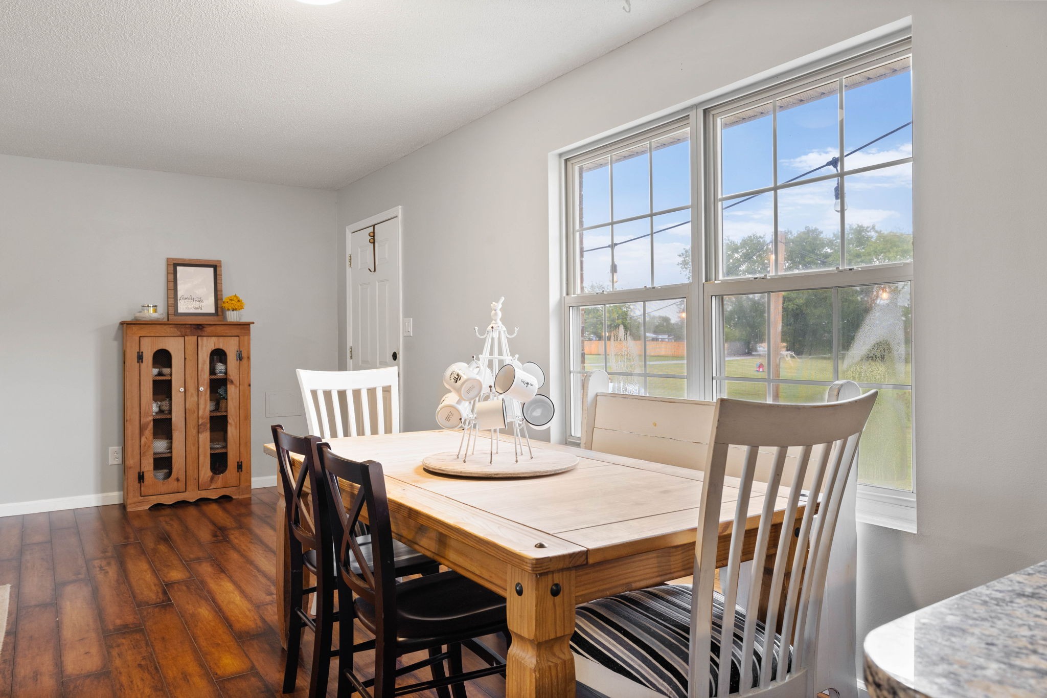 1146 Longview Road Unionville, TN 37180 - Photo 16 of 55 a view of a dining room with furniture window and wooden floor