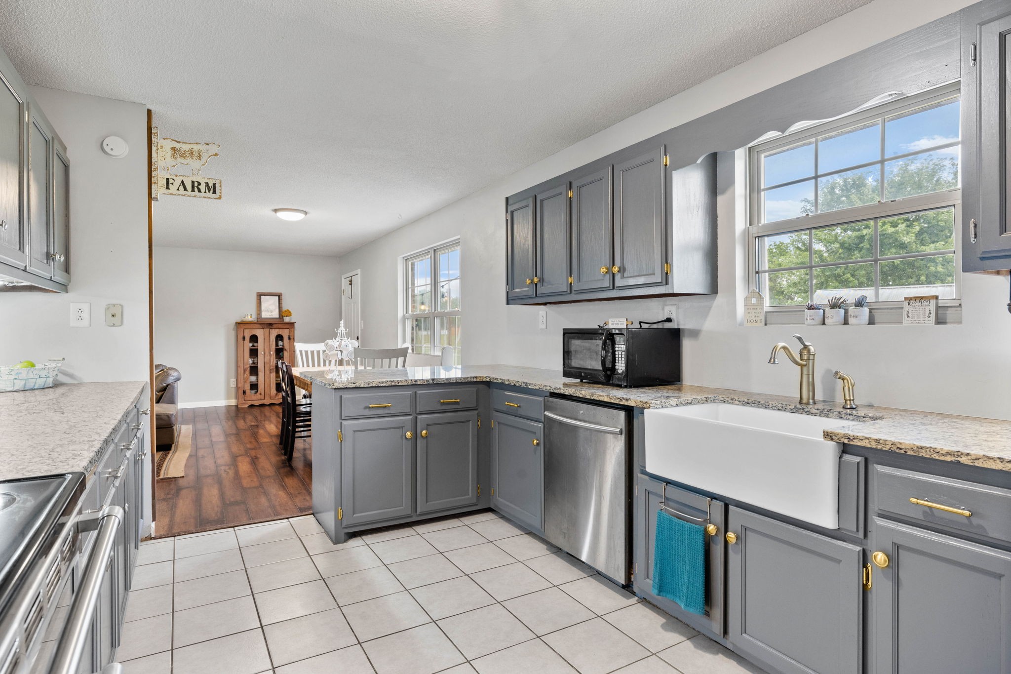 1146 Longview Road Unionville, TN 37180 - Photo 20 of 55 a kitchen with a sink window and cabinets