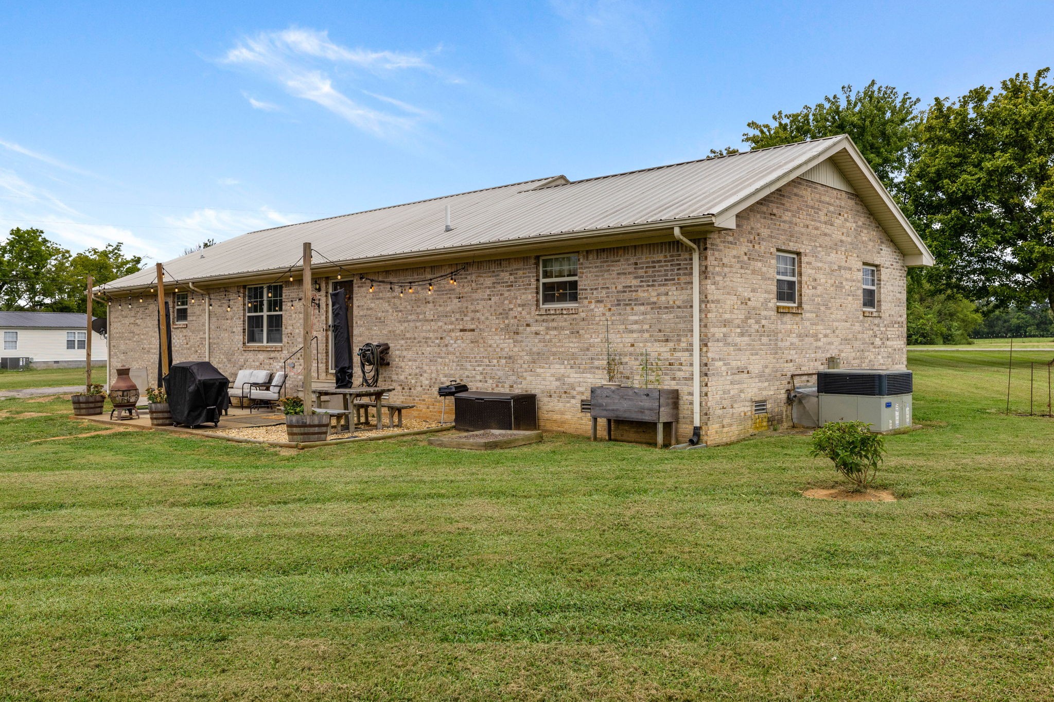1146 Longview Road Unionville, TN 37180 - Photo 38 of 55 a view of a house with backyard