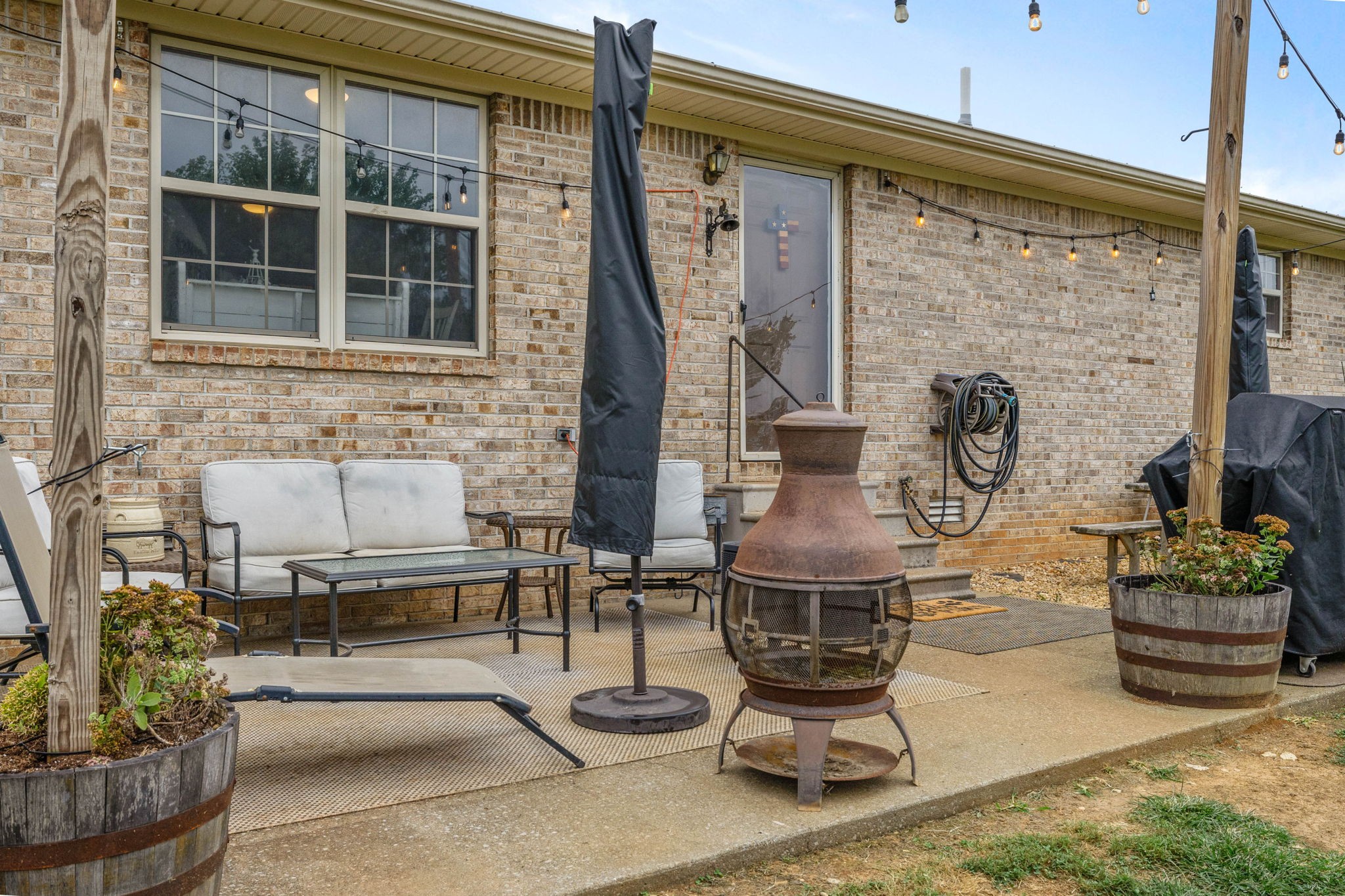 1146 Longview Road Unionville, TN 37180 - Photo 40 of 55 a front view of a house with outdoor seating
