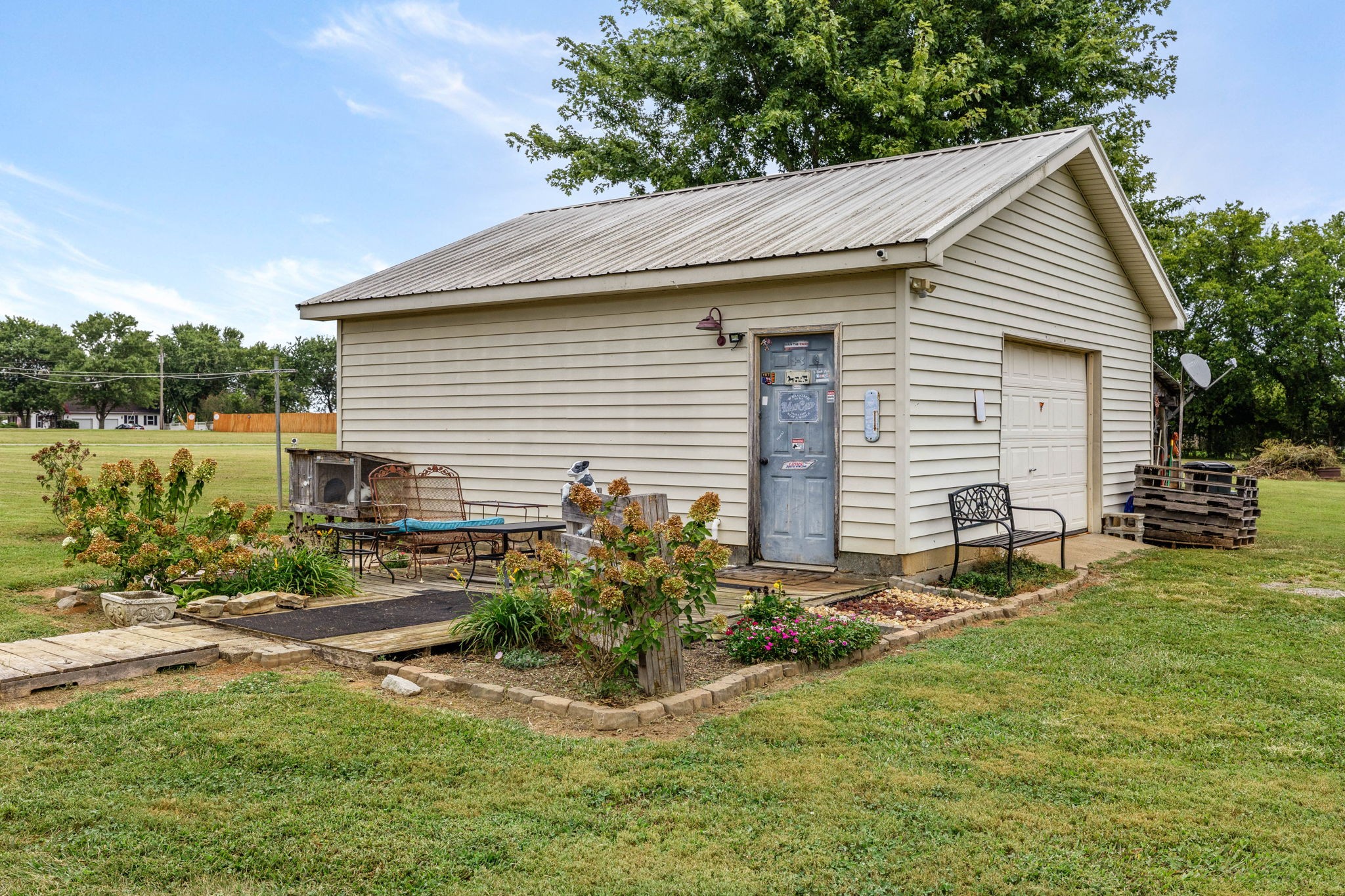 1146 Longview Road Unionville, TN 37180 - Photo 43 of 55 a view of backyard with a garden and plants