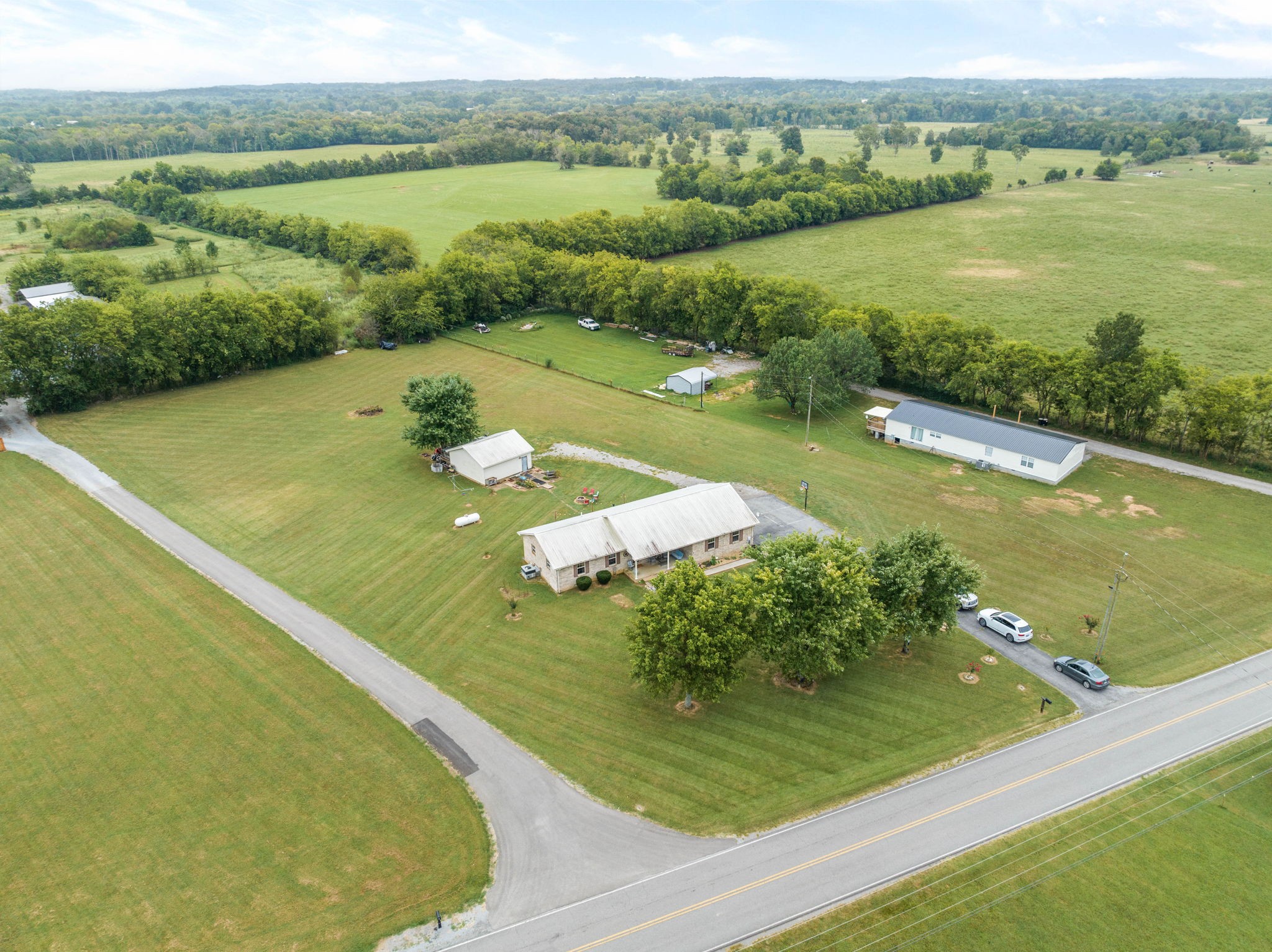 1146 Longview Road Unionville, TN 37180 - Photo 47 of 55 a view of a lake with a big yard