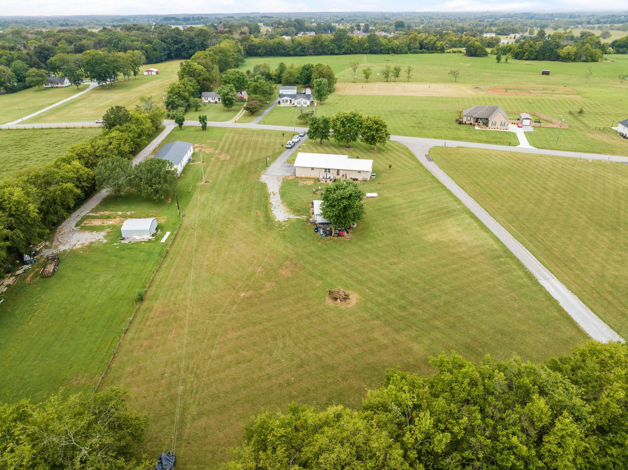 1146 Longview Road Unionville, TN 37180 - Photo 50 of 55 a view of a lake with a swimming pool