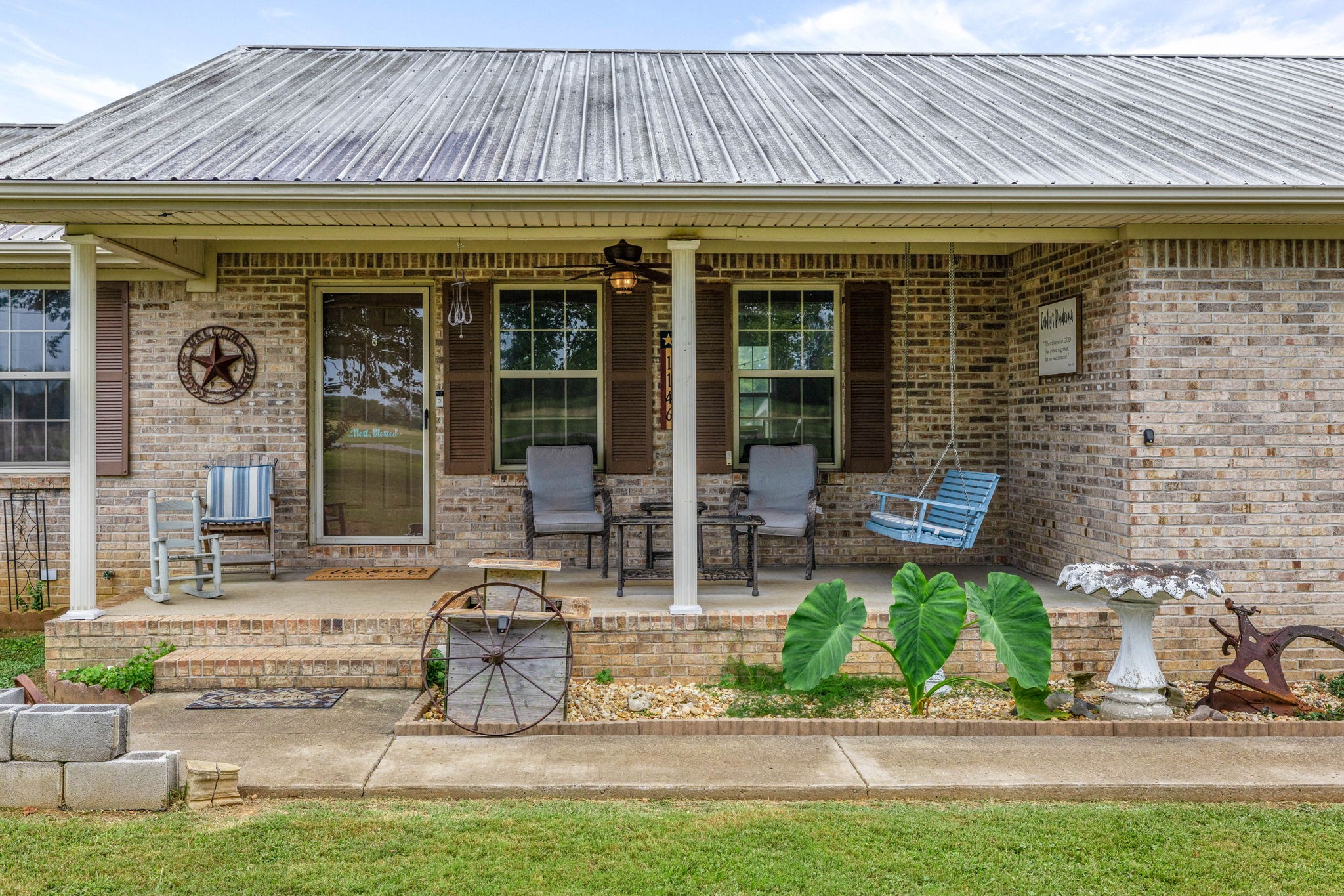 1146 Longview Road Unionville, TN 37180 - Photo 6 of 55 a front view of a house with garden