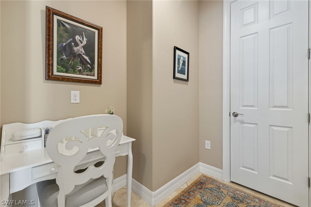 10845 Dennington Road Fort Myers, FL 33913 - Photo 17 of 46 a view of a bedroom with a bed