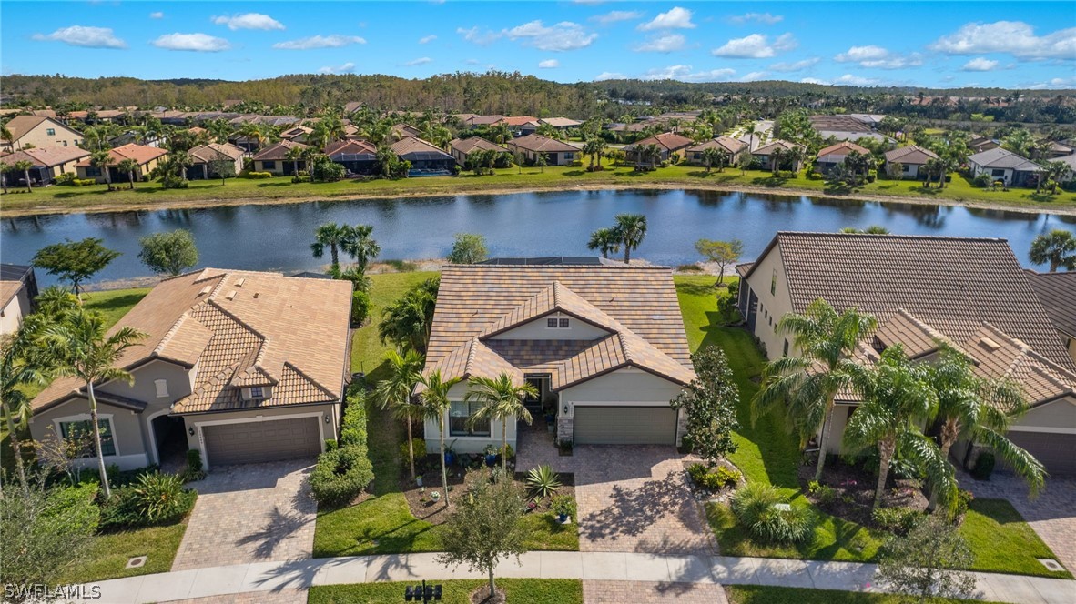 10845 Dennington Road Fort Myers, FL 33913 - Photo 28 of 46 an aerial view of a house with a lake view