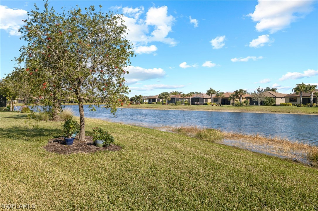10845 Dennington Road Fort Myers, FL 33913 - Photo 30 of 46 a view of a lake with houses in the background