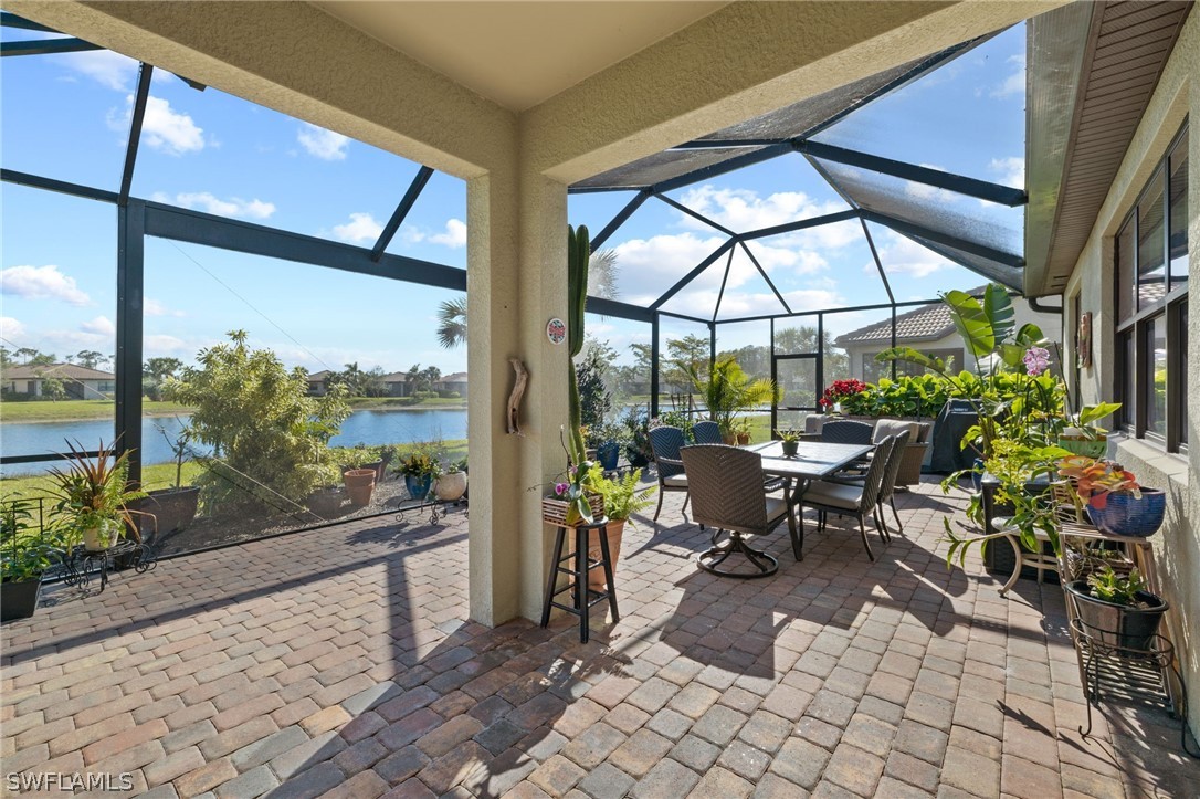 10845 Dennington Road Fort Myers, FL 33913 - Photo 3 of 46 a building outdoor space with furniture and garden view