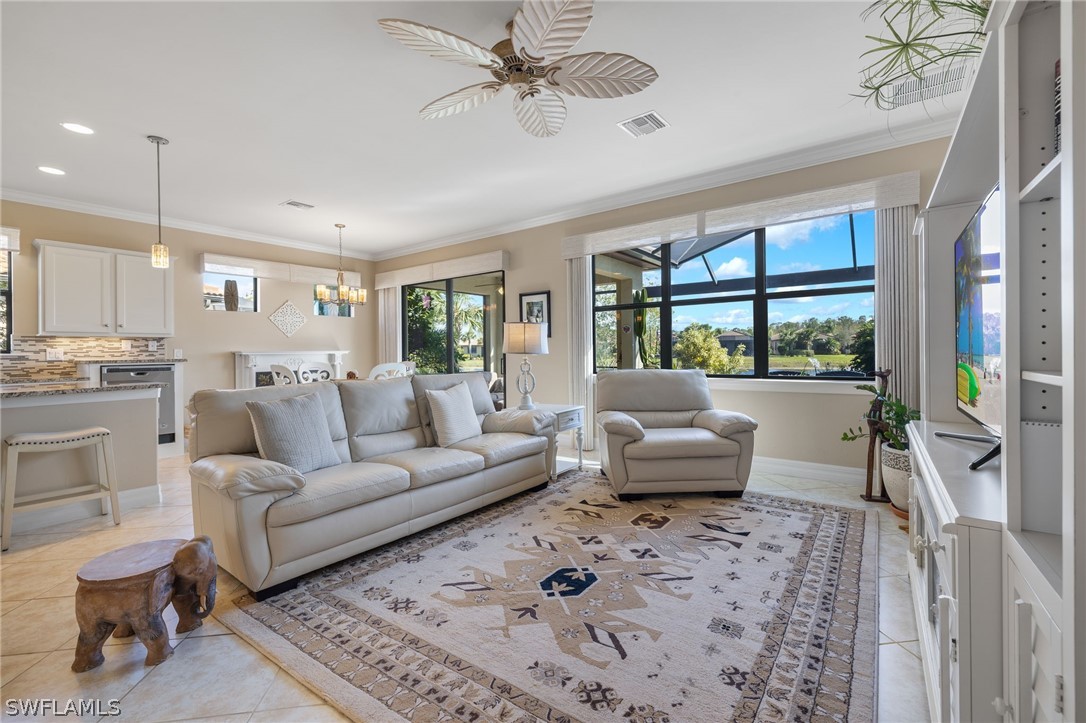 10845 Dennington Road Fort Myers, FL 33913 - Photo 4 of 46 a living room with furniture and a large window
