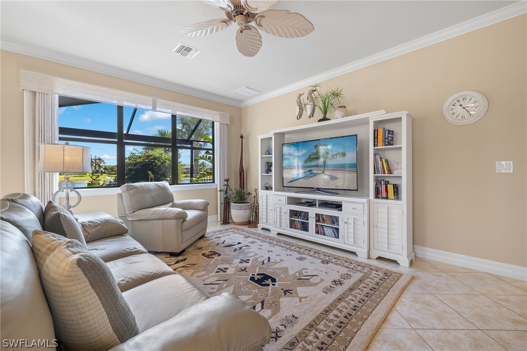 10845 Dennington Road Fort Myers, FL 33913 - Photo 9 of 46 a living room with furniture and a window