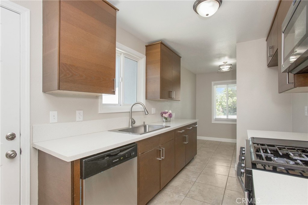 634 Willow Drive Brea, CA 92821 - Photo 3 of 26 a bathroom with a sink and a mirror