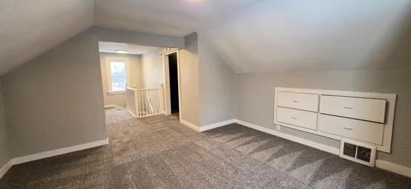 an empty room with cabinet